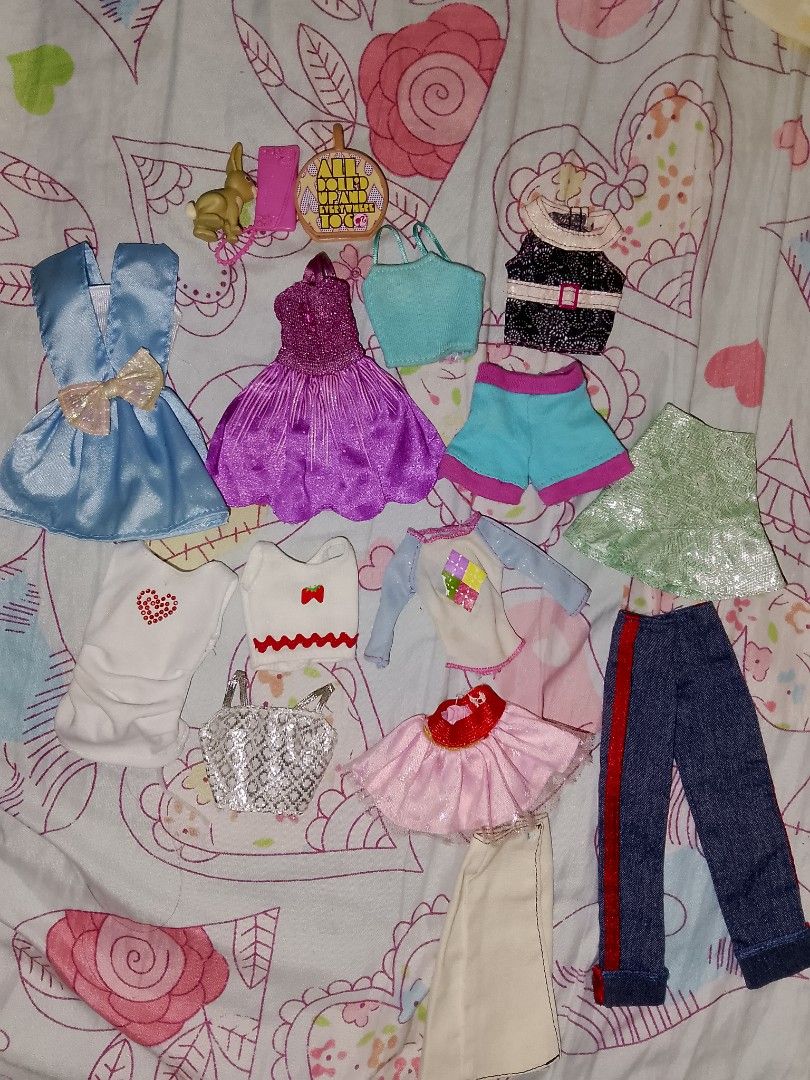 Barbie doll clothes (Category: Kids Toys) located in Bacolod City. Submitted by y2kbimbodolls (Listing ID 1465350812, Image 1). Description: manage ur expectations some are have minimal flaws and some are brand new condition halo halo pero mas lamang ang brandnew condition omg for more details <33 14 pieces of clothing 2 bags 1 pet.