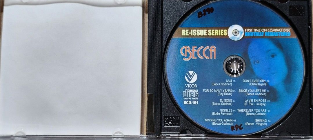 Becca - Re-Issue Series Compact Disc BCD-161 (Category: CDs & DVDs) located in Manila. Submitted by ruelcabrer77078 (Listing ID 1465223645, Image 3). Description: - Item: Becca Debut Album Re-issue CD - Remastering: Digitally remastered by Bobby Tomas - Label & Year: Vicor Music Corporation, 2004 - Catalog Number: BCD-161 - Packaging: Standard jewel case - Tracklist includes: Sam, For So Many Years, DJ Song, Giggles, Missing You Again, Don't Ever