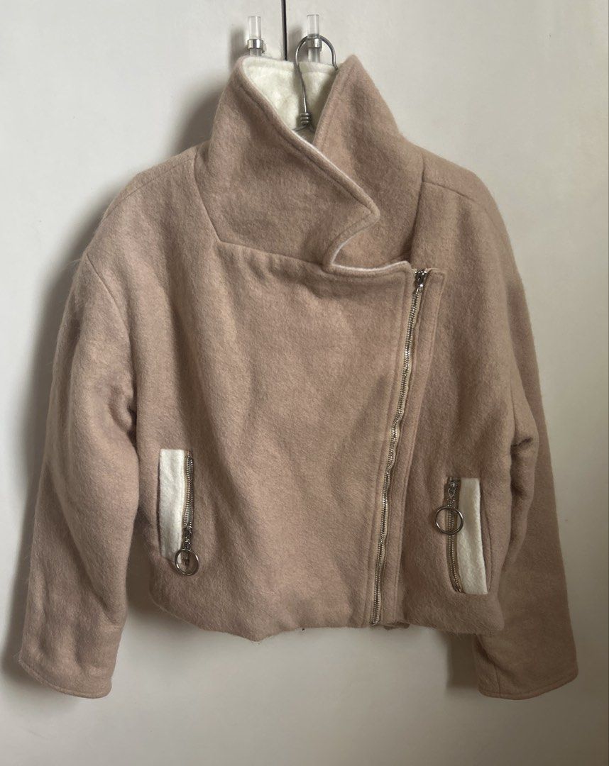 Beige Wool-Blend Autumn/Fall/Winter Jacket (Category: Coats, Jackets and Outerwear) located in Manila. Submitted by randomstuffiown (Listing ID 1465349241, Image 2). Description: - Brand: YML Fashion - Color/Material: Beige wool-blend with soft white fleece lining - Style: Cropped moto jacket with asymmetric front zipper and wide lapels - Pockets: Two front zippered pockets with stylish ring pulls - Condition: Worn only once, pristine condition -