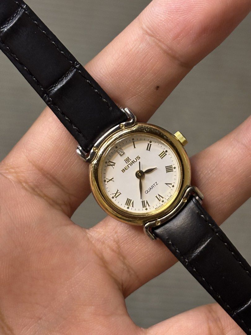 Benrus Ladies Roman Dial (Category: Women's Watches) located in Manila. Submitted by soughtafterseconds (Listing ID 1465372613, Image 2). Description: Benrus Ladies Roman Dial This Benrus Ladies Gold-Tone Diamond Accent Roman Quartz Watch (Ref. 508.980.2) is a dainty piece of 1980s-to-1990s dress horology, pairing classic Cartier-adjacent Roman aesthetics with an ornamental lug construction. Founded in New York City in 1921 by Romanian immigrant 