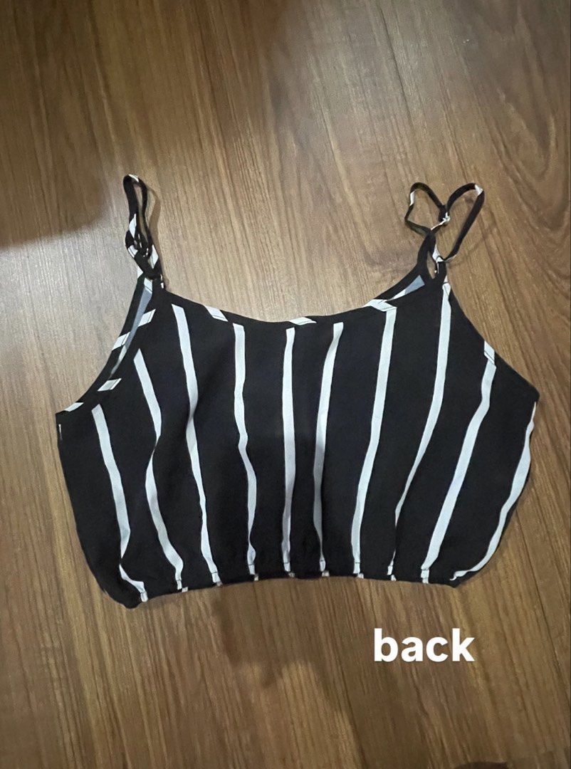 Black and White Striped Crop Top (Category: Blouses) located in Marikina City. Submitted by owloui (Listing ID 1465312929, Image 2). Description: only used once will fit s-m ‼️ NO COD - Adjustable thin shoulder straps for a custom fit - Lightweight and breathable material - Versatile design, great for high-waisted jeans or shorts - Ideal for casual outings and warm weather.