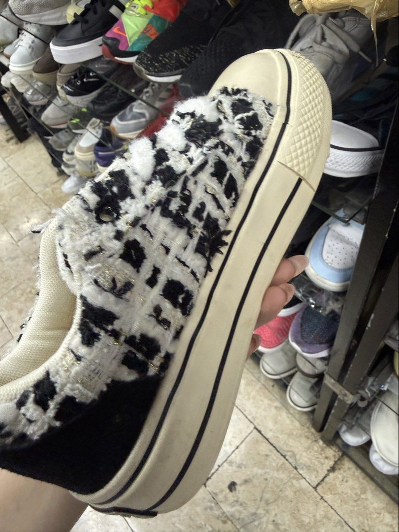Black and White Tweed Platform Sneakers Size 36 (Category: Sneakers) located in Abucay. Submitted by fastlion.584bdf (Listing ID 1465363285, Image 3). Description: - Style: Casual low-top sneakers in Size 36 - Material: Black and white tweed upper with subtle gold thread and frayed edges - Details: Black suede back heel patch and a unique gold chain included inside - Sole: Chunky off-white rubber sole with contrasting black stripes - Laces: Thick