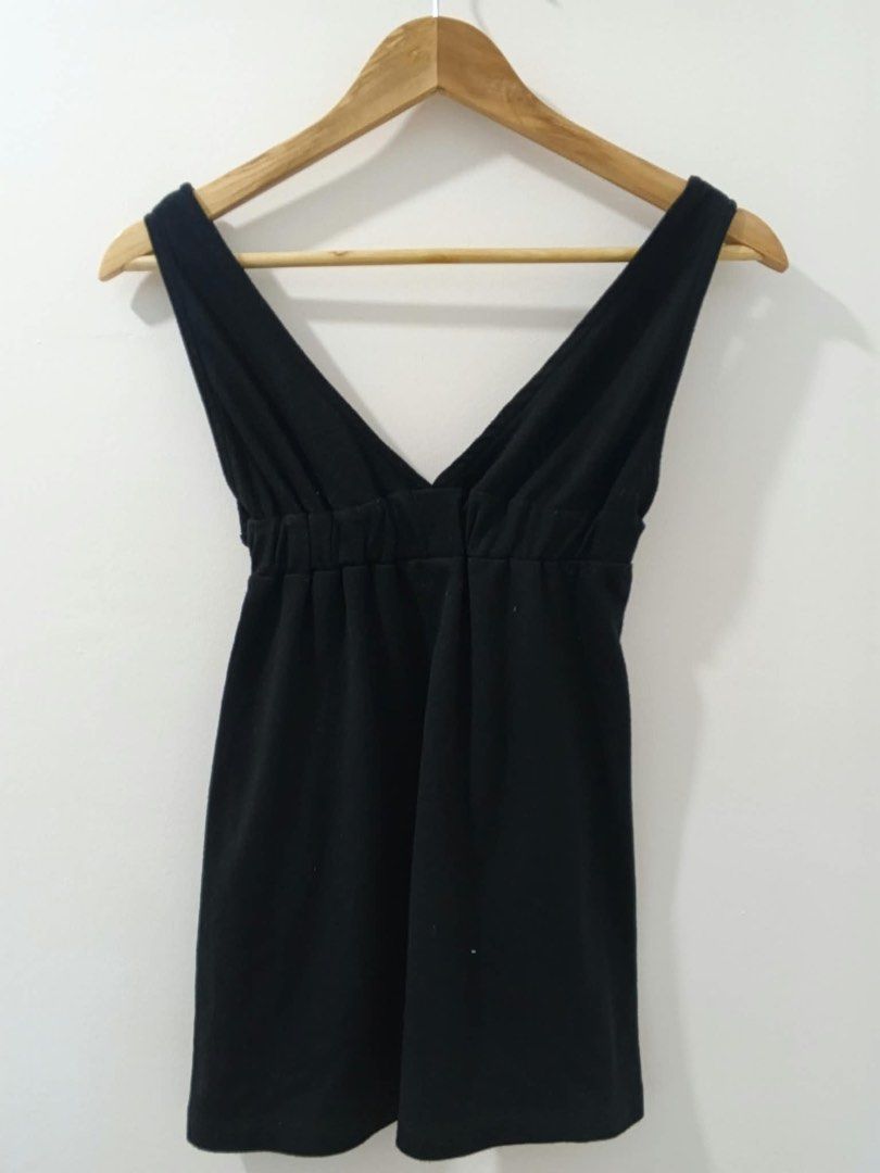 Black deep v neck baby doll top (Category: Dresses) located in Imus. Submitted by sheatwestview (Listing ID 1465313671, Image 1). Description: Used twice Still in good condition, no damages at all Fits S-M No tag but was bought at Singapore.