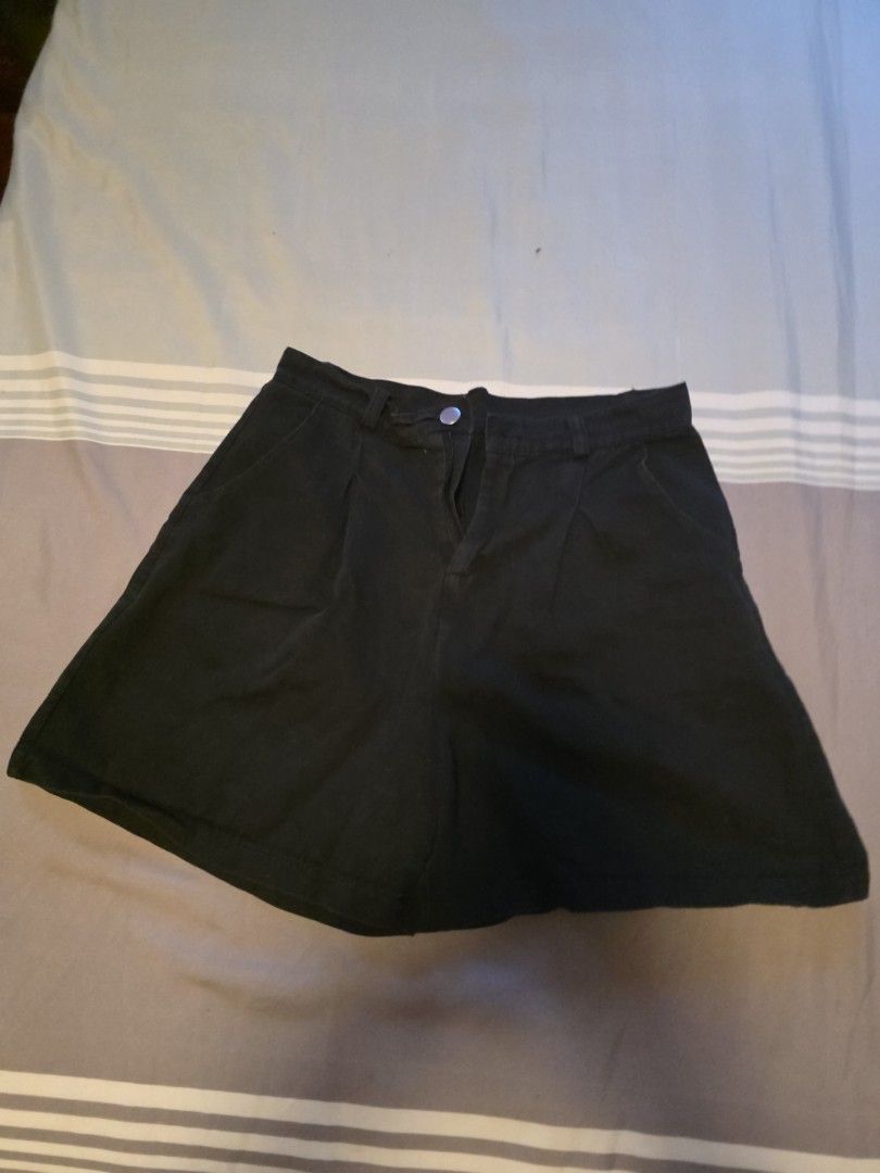 Black Denim Shorts Size M (Category: Shorts) located in Manila. Submitted by cher0918 (Listing ID 1465263287, Image 1). Description: - Style: Classic cut black denim shorts - Size: Medium - Details: Front button fastening with belt loops - Condition: Clean fabric, ready to wear - Versatility: Easy to pair with any casual top for an everyday look.