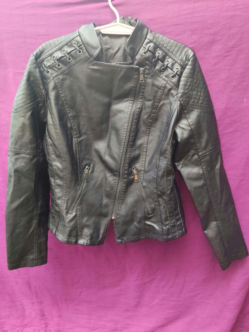Black Faux Leather Biker Jacket Size L (Category: Coats, Jackets and Outerwear) located in Caloocan City. Submitted by kaymatias (Listing ID 1465211196, Image 2). Description: - Style: Black faux leather biker jacket - Size: L (Tag on collar) - Fit: Measures about 17 inches across the back chest - Details: Asymmetrical zipper, zipped front pockets, dark lining - Accents: Quilted shoulder panels with lace-up ring details - Condition/Use: Great out