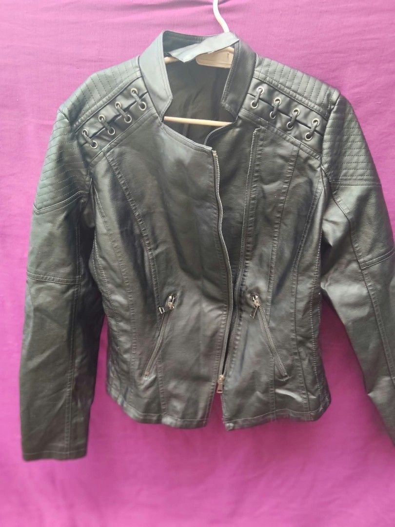 Black Faux Leather Biker Jacket Size L (Category: Coats, Jackets and Outerwear) located in Caloocan City. Submitted by kaymatias (Listing ID 1465211196, Image 3). Description: - Style: Black faux leather biker jacket - Size: L (Tag on collar) - Fit: Measures about 17 inches across the back chest - Details: Asymmetrical zipper, zipped front pockets, dark lining - Accents: Quilted shoulder panels with lace-up ring details - Condition/Use: Great out