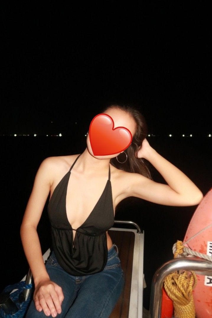 Black halter top open back plunge neckline (Category: Sleeveless) located in Manila. Submitted by nicole_alega (Listing ID 1465226709, Image 2). Description: - Color: Black - Style: Halter top with plunging neckline and open back - Fit: Lightweight, body-hugging fabric with adjustable tie straps at neck and back - Perfect for a stylish night out!.