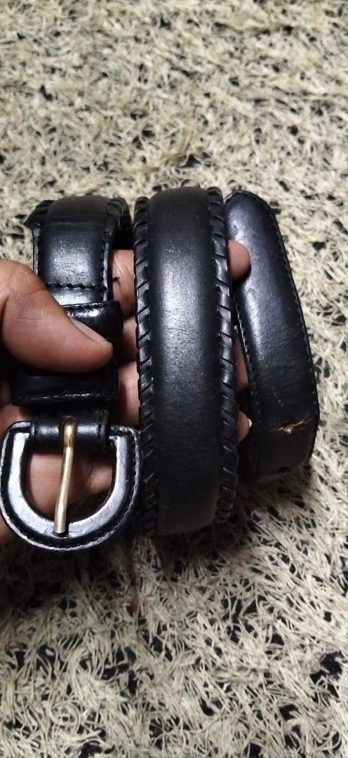 Black Leather Belt with D-Ring Buckle (Category: Belts) located in Paranaque City. Submitted by michael-08 (Listing ID 1465209867, Image 1). Description: - Color: Black - Material: Genuine leather with braided edge detailing - Hardware: Gold-tone D-ring buckle and dual leather keepers - Closure: Standard hole punch adjustments - Style: Classic and versatile - Best Paired With: Casual trousers or jeans - Condition: Brand new / Excellent quality WA