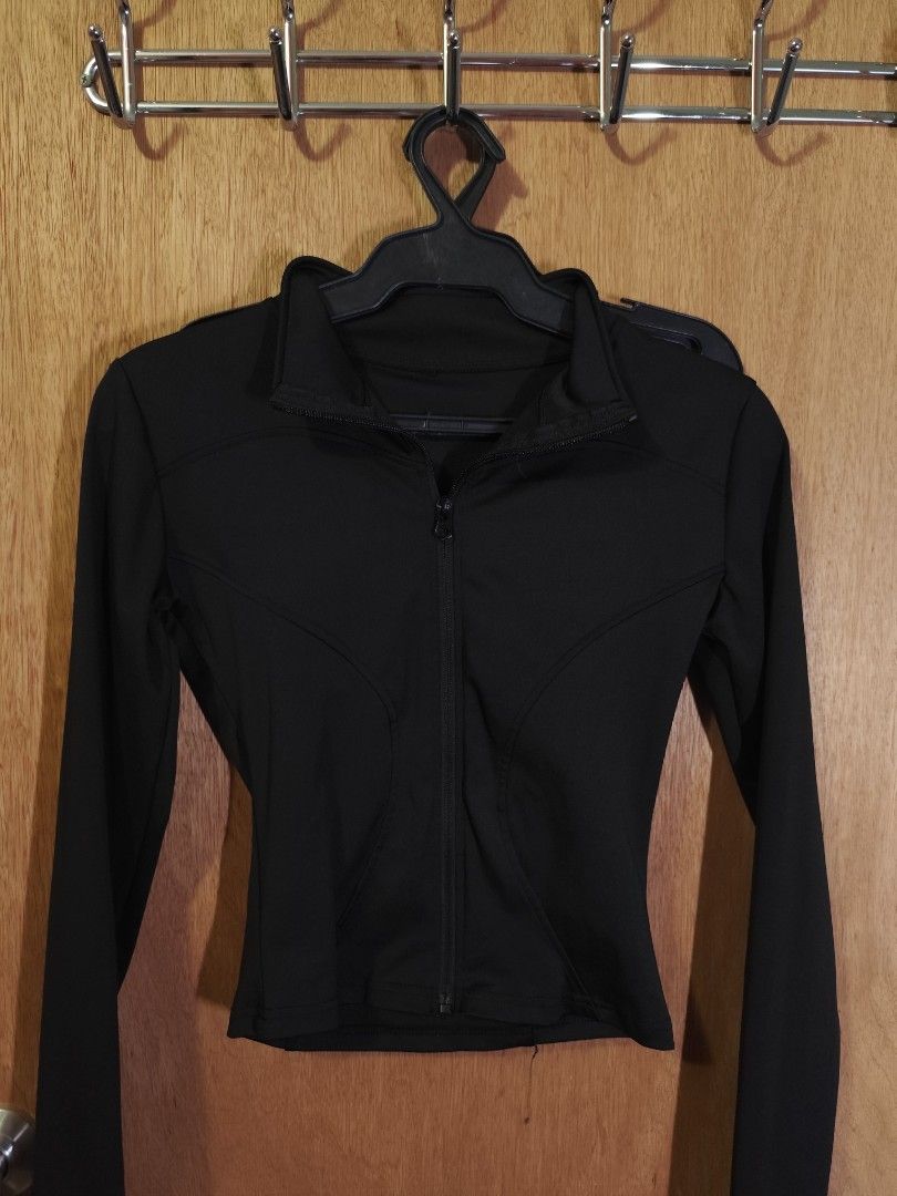 Black Long Sleeve Zip Up Athletic Jacket (Category: Coats, Jackets and Outerwear) located in Caloocan City. Submitted by wisegem-c6c7 (Listing ID 1465231586, Image 1). Description: - Color: Solid black - Design: High collar with full front zipper and flattering curved panel seams - Fit: Fitted style with long sleeves and clean hem - Material: Lightweight, stretchy, and comfortable activewear fabric - Condition: Excellent / Brand New - Mode of Pay