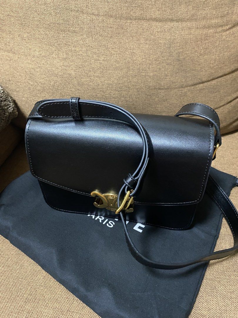 Black Medium Shoulder Bag (Category: Cross-body Bags) located in Makati City. Submitted by dpjanssen (Listing ID 1465304180, Image 3). Description: - - Premium black calfskin leather - Hardware: Gold-tone Triomphe closure and metal rings - Strap: Adjustable shoulder strap - Interior: Multiple compartments with a convenient zippered pocket divider - Condition: Clean interior and exterior - Inclusion: with dust bag - nice in actual - Rfs: urgent ne