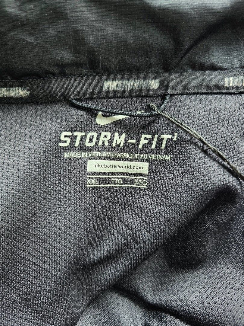 black Nike Storm-Fit running windbreaker jacket (Category: Coats, Jackets and Outerwear) located in Baguio. Submitted by kayeonlineshop (Listing ID 1465254647, Image 3). Description: -black Nike Storm-Fit running windbreaker jacket featuring a full zip closure and asymmetrical chest pockets -free sf within luzon.