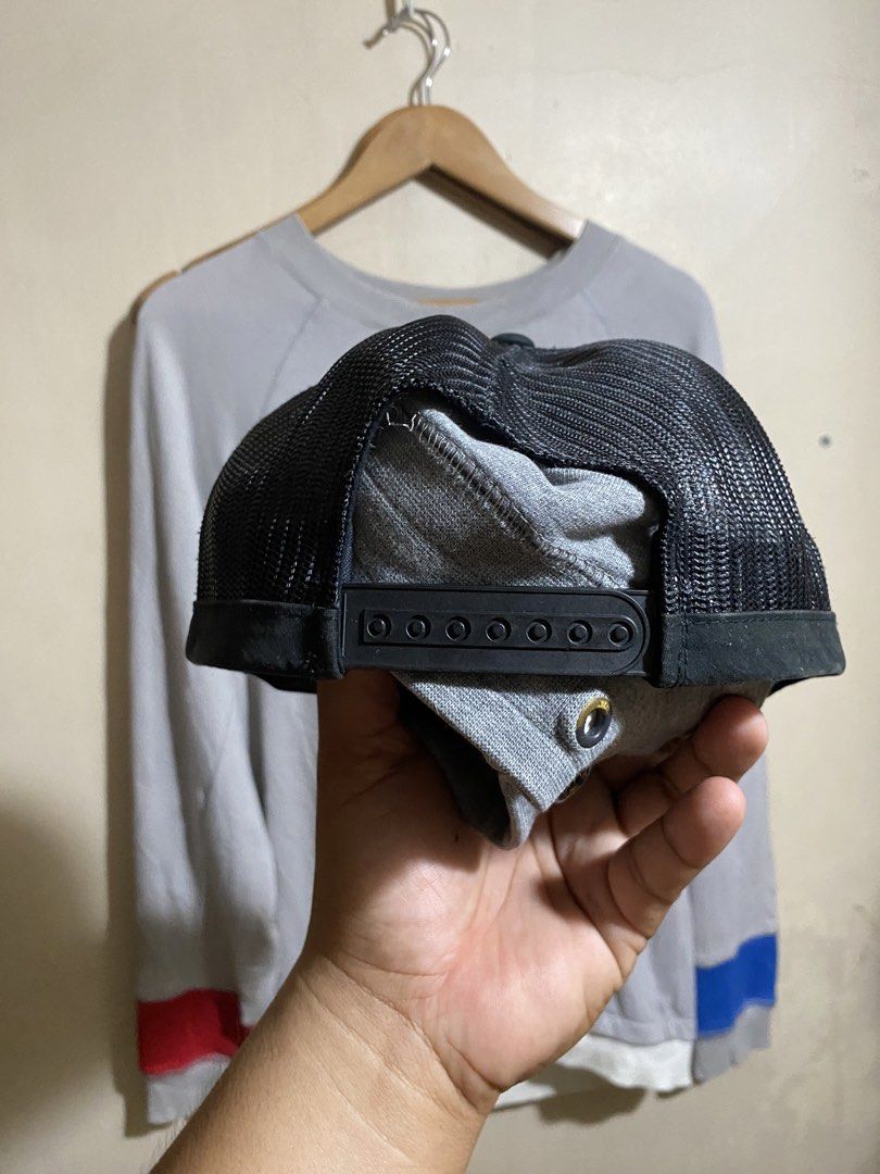 Black Trucker Hat with White Skull and Crossbones (Category: Caps & Hats) located in Bocaue. Submitted by pards23 (Listing ID 1465298045, Image 3). Description: - Color: Classic black with white details - Design: White rubber skull and crossbones logo on front - Details: Unique triple circle logos on the side - Backing: Breathable mesh panels for all-day comfort - Fit: Adjustable snapback closure for a custom fit - Brim: Stylish solid flat brim C
