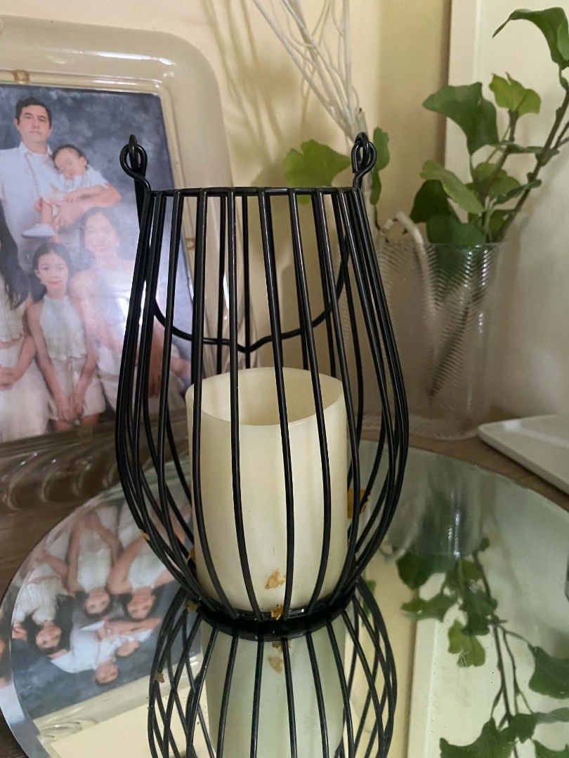 Black wire candle holder with led candle (Category: Lighting) located in Makati City. Submitted by larasdowry (Listing ID 1465250748, Image 1). Description: used then stored. probably not working. The led candle can be replaced. 3pcs available.