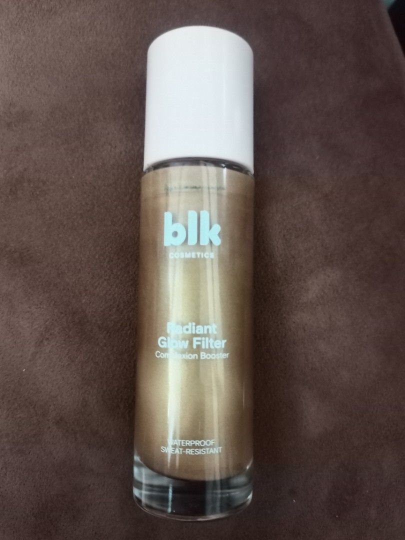BLK Cosmetics Radiant Glow Filter Complexion Booster (Category: Makeup) located in Manila. Submitted by maryel10010 (Listing ID 1465302840, Image 2). Description: - Brand: blk cosmetics - Product: Radiant Glow Filter Complexion Booster - Formula: Waterproof and sweat-resistant - Packaging: White cap with a clear glass base, generous size bottle - Condition: Brand new / Authentic - Perfect for achieving an effortless, glowing look all day!.