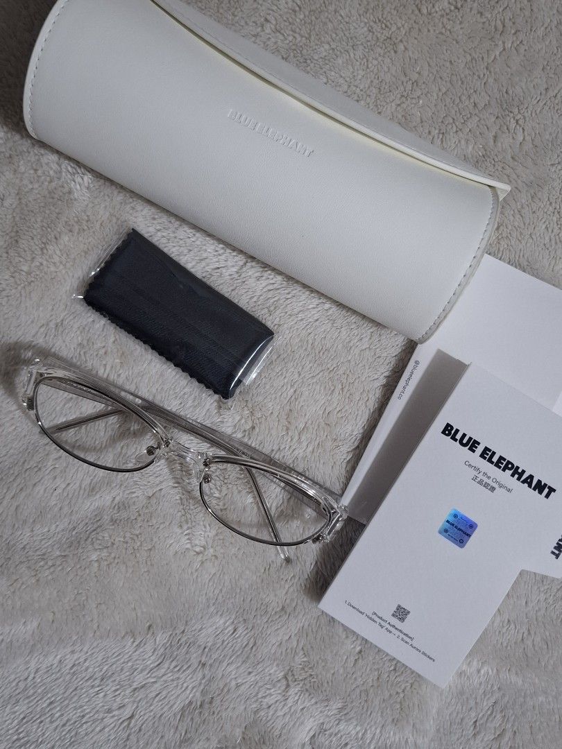 Blue Elephant Aeslit in Crystal (Category: Sunglasses & Eyewear) located in Cainta. Submitted by itsbeyoungkuh (Listing ID 1465271949, Image 3). Description: - Brand/Model: Blue Elephant Aeslit Glasses - Colorway: Crystal - Condition: Barely used, tried on 2-3 times only (didn't fit face shape) - Authenticity: 100% authentic, scan QR code on card via Hidden Tag app - Inclusions: Original white case, cleaning cloth, and product authentication card