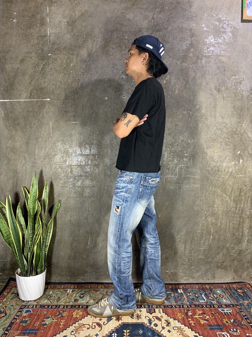 Blue Mong Bootcut Jeans (Category: Jeans) located in Aurora. Submitted by cpr_garments13 (Listing ID 1465305947, Image 2). Description: Models height 5’6 •Waist:36 •Thigh:11.5 •Length:37.5 •Leg opening:8.5 Excellent condition -Distressing Design -Altered Length .