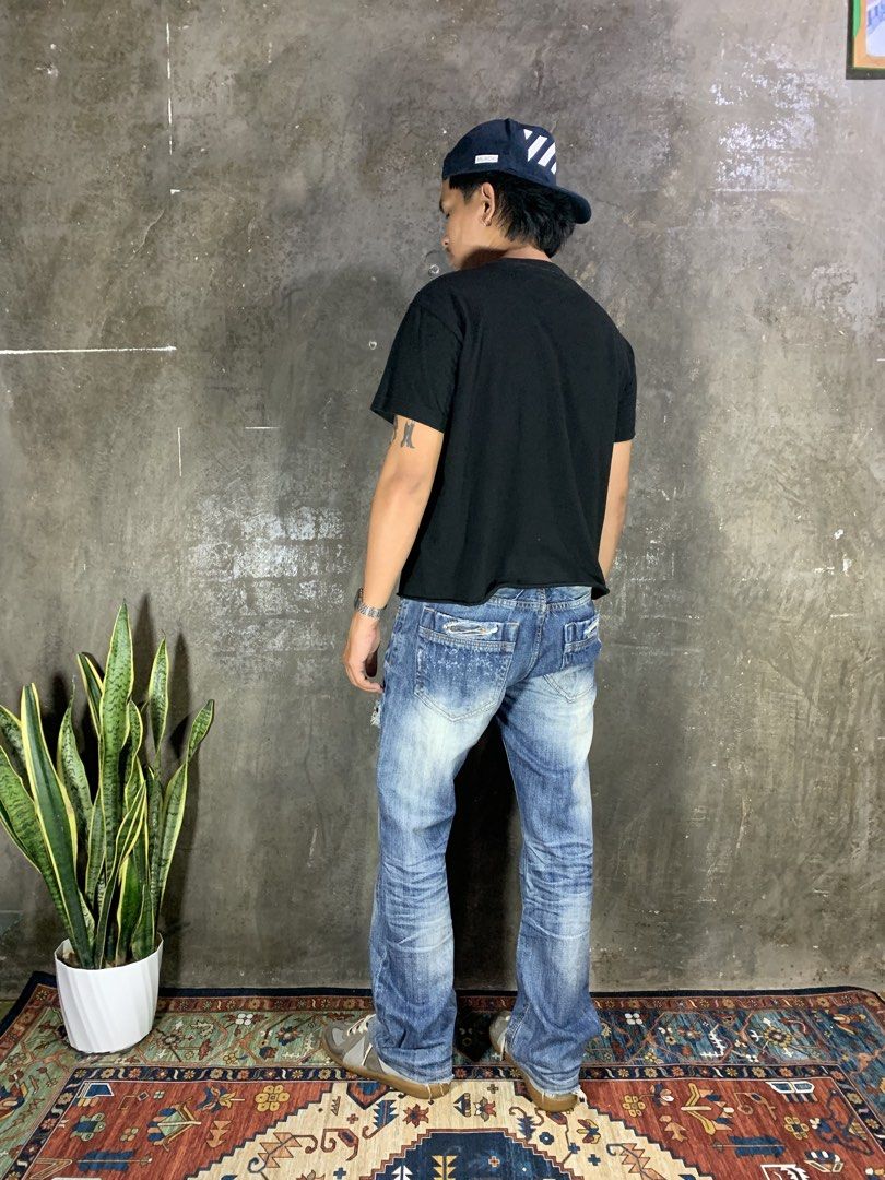 Blue Mong Bootcut Jeans (Category: Jeans) located in Aurora. Submitted by cpr_garments13 (Listing ID 1465305947, Image 3). Description: Models height 5’6 •Waist:36 •Thigh:11.5 •Length:37.5 •Leg opening:8.5 Excellent condition -Distressing Design -Altered Length .