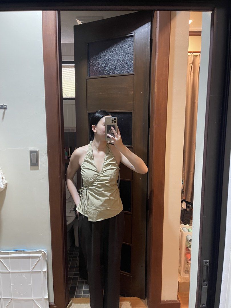 BNWT Zara Crossover Halter Top Sage Green (Category: Sleeveless) located in Davao. Submitted by julyanna522 (Listing ID 1465221993, Image 2). Description: - Brand new w/ tag - Color: Sage green - Style: Crossover halter top with V-neckline - Fit: True to size with adjustable side ties and garterized back (stretchable) - Available size: Large - For reference: wearing a size medium in the pic and I’m waist 27 bust 32 - + ₱50 sf.