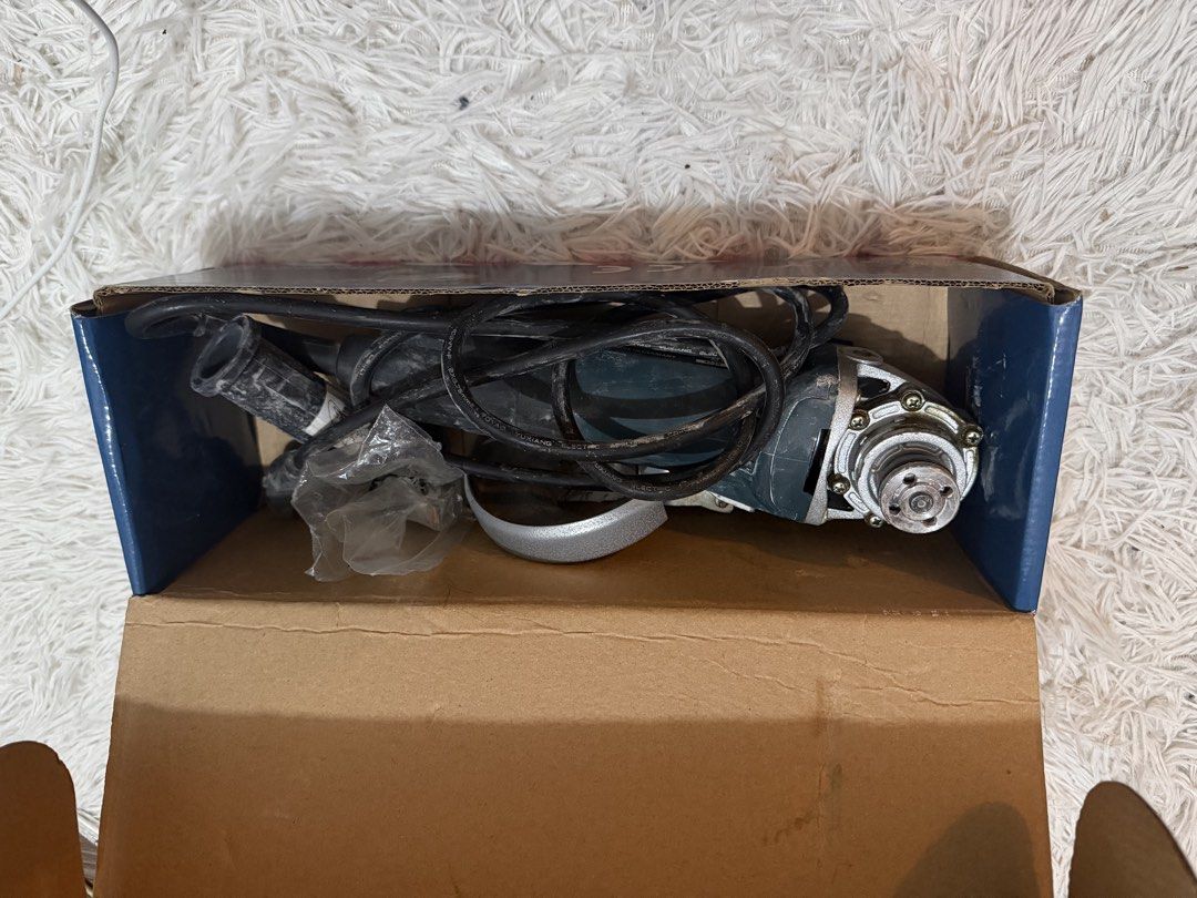 Bosch Angle Grinder With Original Box (Category: Construction Tools & Equipment) located in Manila. Submitted by iamtruekin00402 (Listing ID 1465352285, Image 2). Description: - Brand: Bosch Angle Grinder - Condition: Brand new in original box with complete standard components - Performance: Powerful motor for cutting, grinding, and polishing - Design: Sturdy build with ergonomic handle for a secure and comfortable grip - Power: Plugs into standa