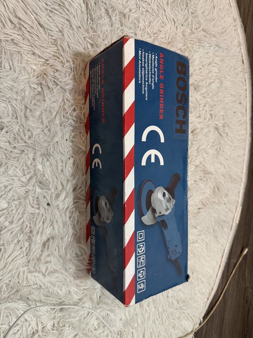 Bosch Angle Grinder With Original Box (Category: Construction Tools & Equipment) located in Manila. Submitted by iamtruekin00402 (Listing ID 1465352285, Image 1). Description: - Brand: Bosch Angle Grinder - Condition: Brand new in original box with complete standard components - Performance: Powerful motor for cutting, grinding, and polishing - Design: Sturdy build with ergonomic handle for a secure and comfortable grip - Power: Plugs into standa
