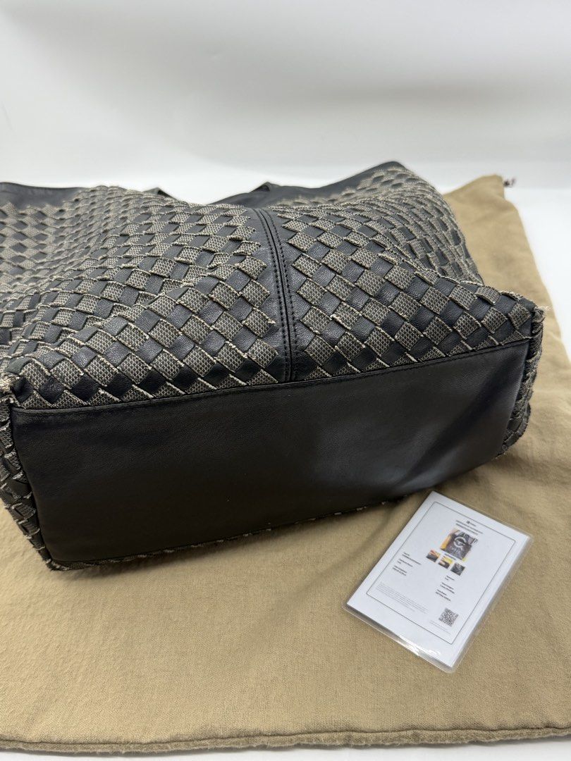 Bottega Veneta (Category: Tote Bags) located in Caloocan City. Submitted by rossvault2 (Listing ID 1465240933, Image 3). Description: - Brand: authentic bottega Veneta - Color: Classic Black - Material: Signature intrecciato woven pattern and smooth leather - Features: Spacious interior, sturdy shoulder straps, easy shoulder carry - Condition: Minor wear along the woven fabric edges near the bottom corners - Inclusions: Original dust bag and auth