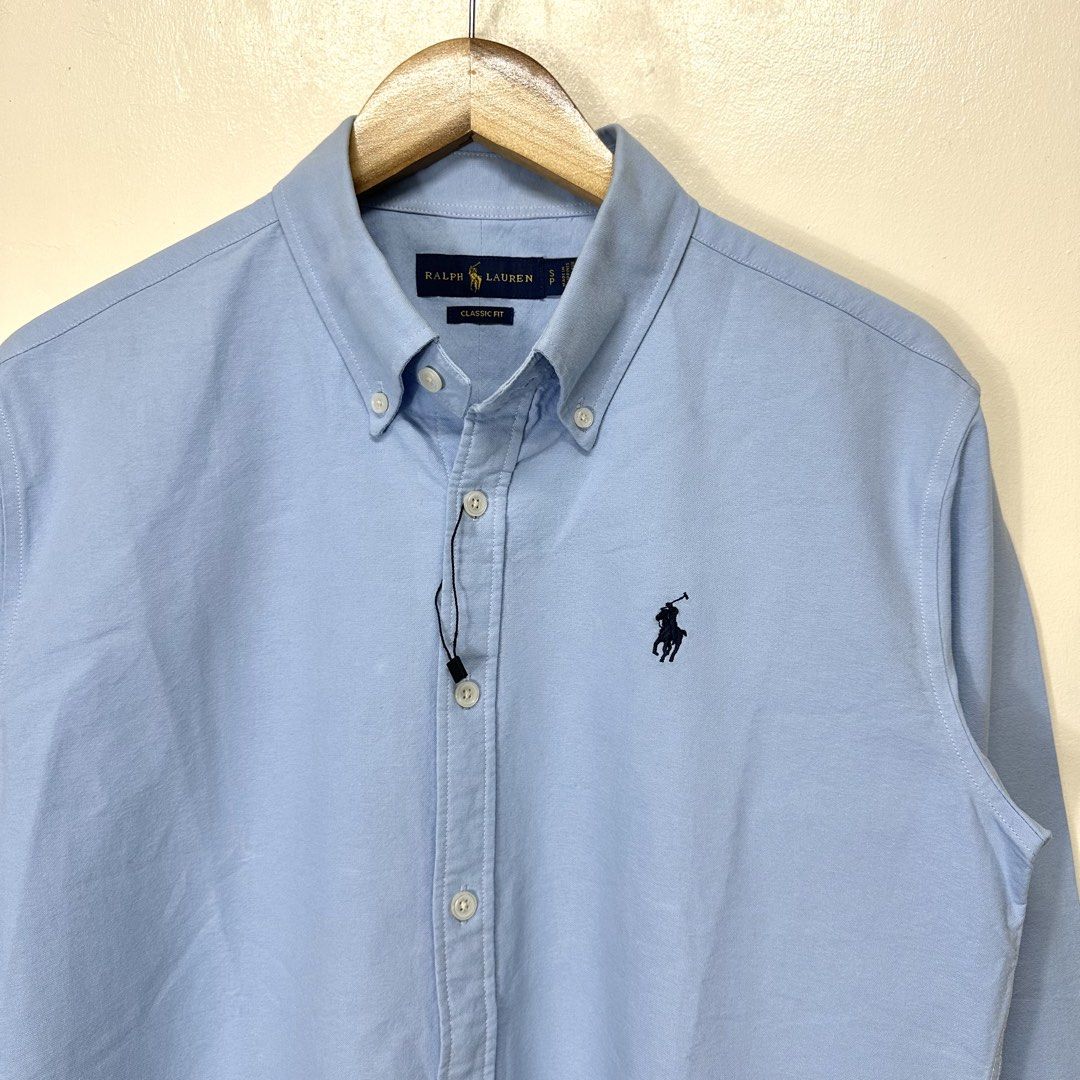 Brand new Ralph Lauren Button down Long sleeves (Category: Formal Shirts) located in Manila. Submitted by dane.closet (Listing ID 1465340543, Image 1). Description: Brand new Ralph Lauren Button down Long sleeves Size: Small on tag best fit to Medium Dimension: 21x29 Brand new No flaws at all Authentic/Original Price: 3500 ✔️COD via Lalamove ✔️Door to door delivery via J&T express ✔️Open for meetups around Makati Area Dm me 💯.