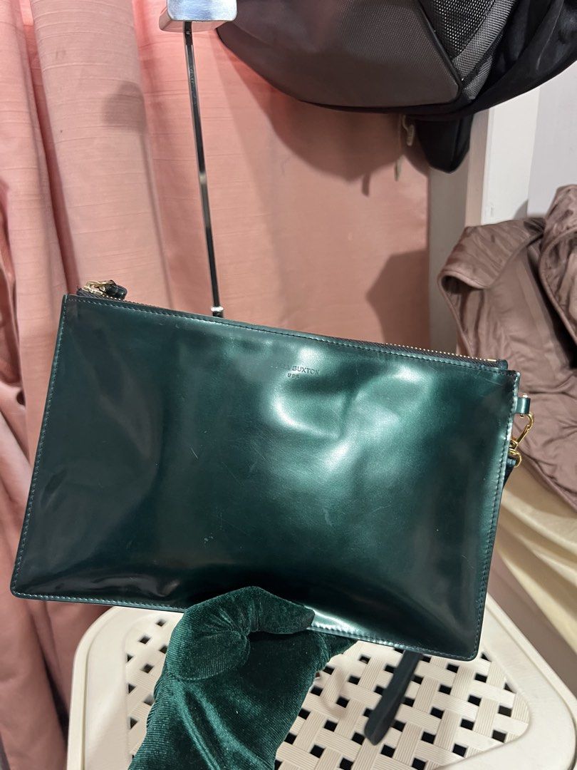 branded passport/ passbook / document holder (Category: Clutches) located in Baguio. Submitted by mercedeshermosamoran (Listing ID 1465347596, Image 1). Description: W- 10 1/2 inches L- 7 inches.