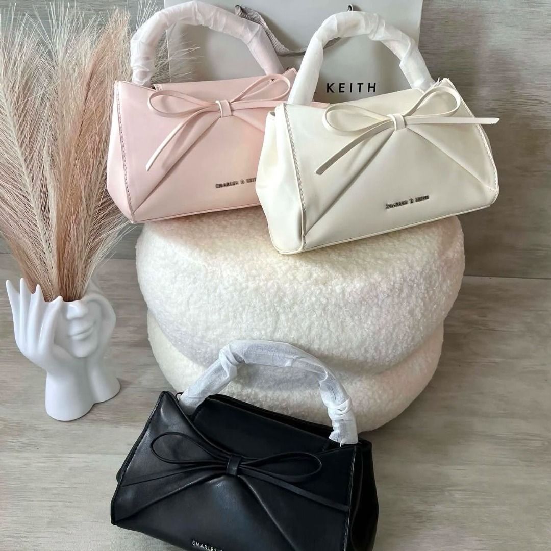Brandnew (Category: Cross-body Bags) located in Quezon City. Submitted by mjmbagsandwatches (Listing ID 1465275472, Image 1). Description: CnK Hazel Bow Panelled Top Handle Bag ✅ 1,250 each +sf ✅ Size: (H)12.5cm x (W)20cm x (D)7cm ✅ Paperbag Add 99 ✅ M P 0 & Brandnew 📸 Actual Pictures Posted 📲 PM for orders and inquiries 📌We Ship Nationwide (+SF) 📌No Return, No Exchange 📌If in DOUBT, please DO NOT Transact 📌We are not liable for any LOSS or