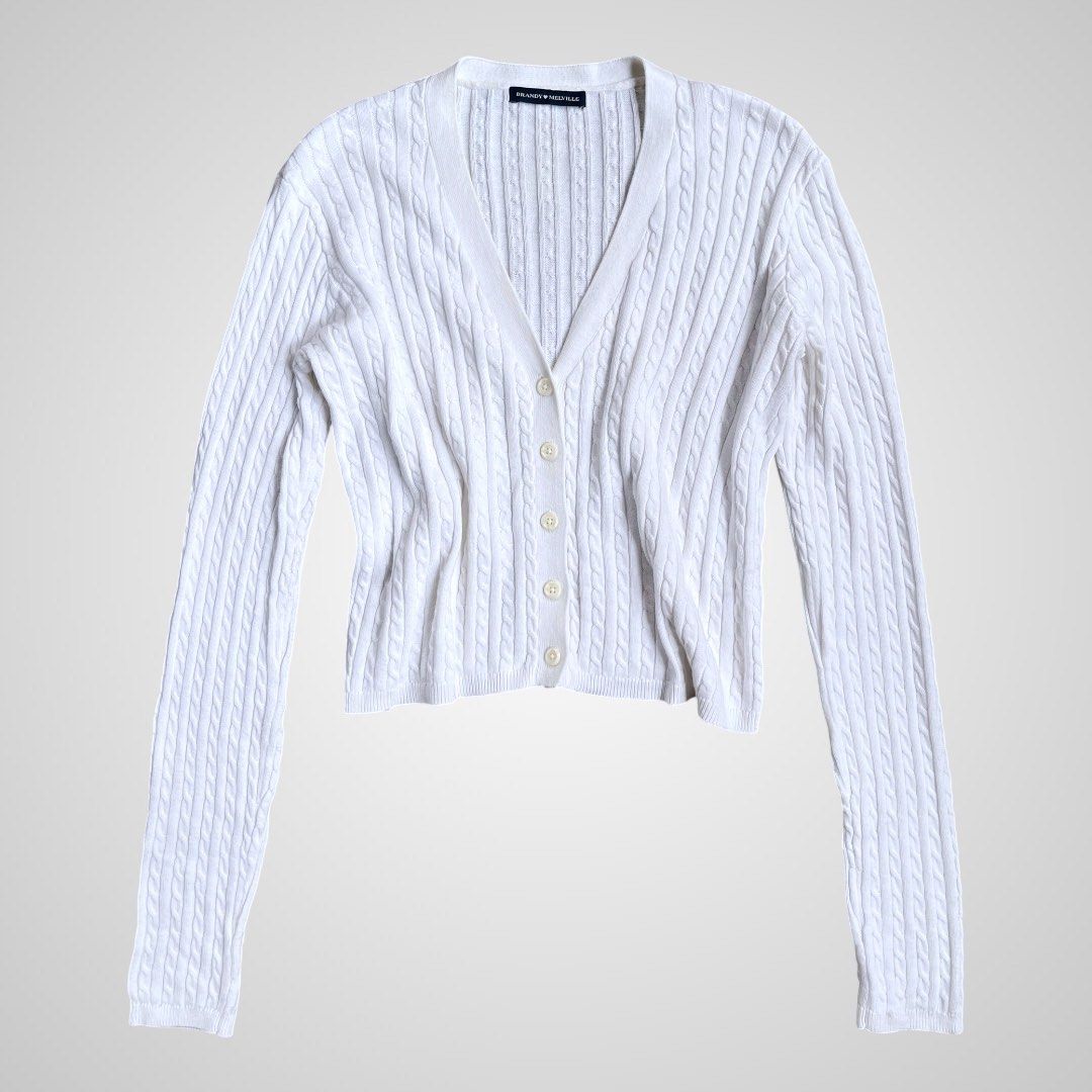 Brandy Melville White Cable Knit Cardigan (Category: Coats, Jackets and Outerwear) located in Calamba. Submitted by sellinggrannyscloset (Listing ID 1465374408, Image 2). Description: BRANDY MELVILLE KNITTED SIZE: M-L LENGTH: 17.5 WIDTH: 19 CONDITION: 9/10 ISSUE: X.
