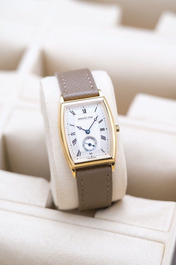 Breguet Heritage Yellow Gold (Category: Luxury Watches) located in Quezon City. Submitted by awristotell (Listing ID 1465288921, Image 2). Description: “Another Wrist To Tell” Breguet Heritage Yellow Gold Mint Condition Price: 468,000 PHP Ref: 8670BA Year: 2004 Movement: Automatic Crystal: Sapphire Case: 30x25mm Material: 18k Yellow Gold Lug width: 16mm Bracelet: Original Breguet Black Leathee Strap / AM Leather Strap with Original Breguet 18k Ye