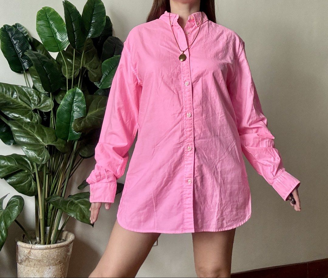 Bright Pink Oversized Button-Up Shirt,s to m (Category: Shirts) located in Mandaluyong City. Submitted by roxieeeeeee (Listing ID 1465342873, Image 3). Description: - Color: Vibrant bright pink - Fit: Oversized and relaxed - Material: Lightweight cotton-blend - Details: Long sleeves with button cuffs, classic collar, and curved hem - Styling: Wear tucked in, open over a tank, or solo as a shirt dress - Condition: Clean, smoke-free home ✅ Like new