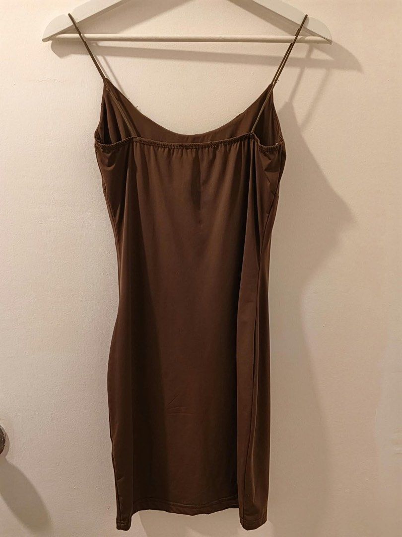 Brown body hugging ruffled mini dress (Category: Dresses) located in Imus. Submitted by sheatwestview (Listing ID 1465321143, Image 2). Description: Size: XS - Small Used once Prices are nego!.