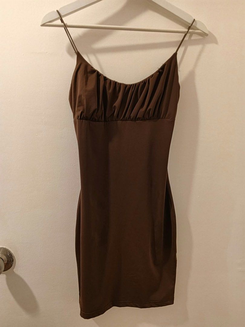 Brown body hugging ruffled mini dress (Category: Dresses) located in Imus. Submitted by sheatwestview (Listing ID 1465321143, Image 1). Description: Size: XS - Small Used once Prices are nego!.