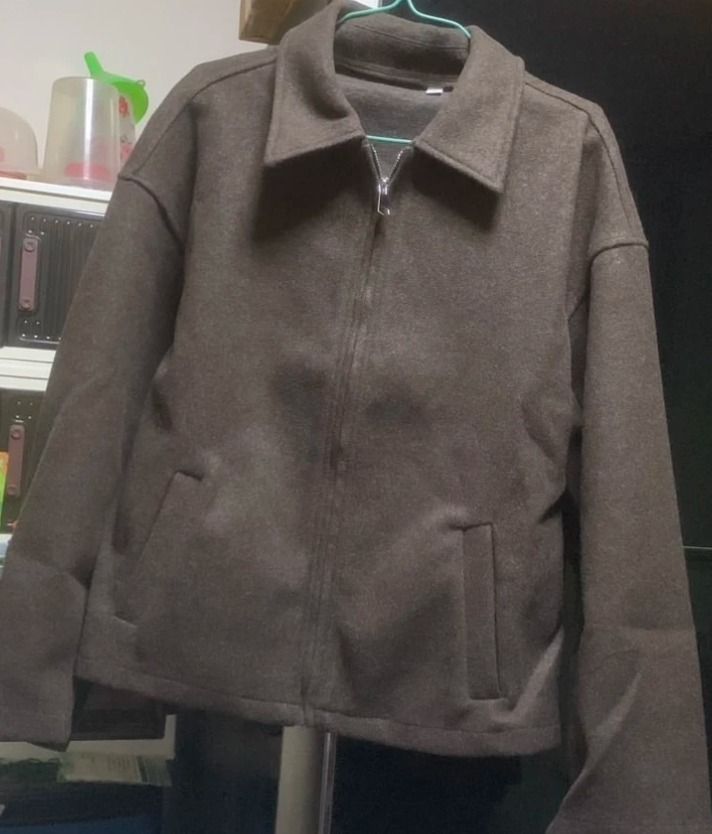Brown Collared Zip-Up Jacket (Category: Coats, Jackets and Outerwear) located in Consolacion. Submitted by thisislorraine (Listing ID 1465204466, Image 1). Description: - Color: Brown - Fits Small to Med - Material: Textured wool-blend fabric - Design: Classic shirt-style collar with a front metal zipper - Pockets: Two functional slanted front pockets near the hem - Fit: Long sleeves with dropped shoulders for a relaxed look - Styling: Great for 