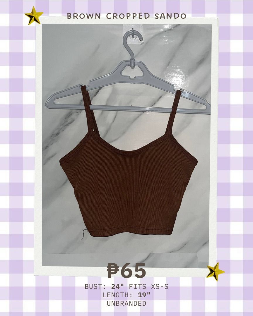 Brown Cropped Sando PLEASE READ 3RD PHOTO (Category: Sleeveless) located in Quezon City. Submitted by memoriies (Listing ID 1465277997, Image 1). Description: - Color: Brown - Style: Cropped sando with ribbed texture - Size: Fits XS to S frames comfortably - Material: Super stretchy cloth - Perfect for: Everyday casual wear, easy to pair with high-waisted jeans or shorts.