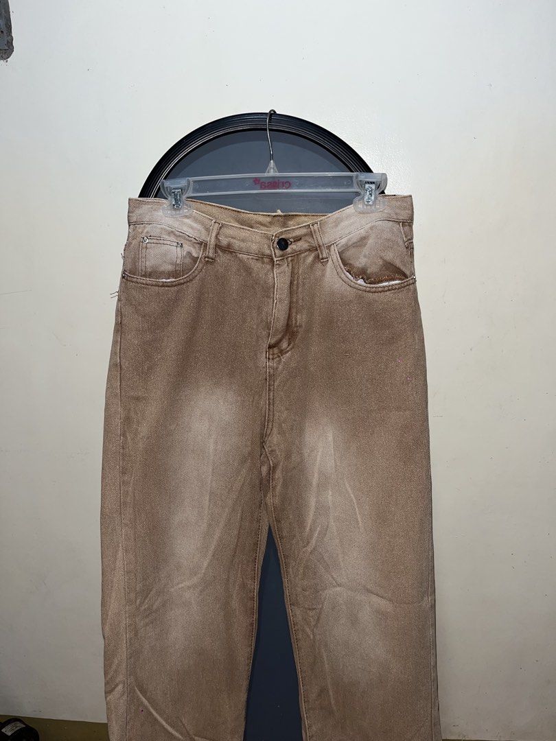 Brown denim pants straight leg (Category: Jeans) located in Rizal. Submitted by bypc5678 (Listing ID 1465357643, Image 1). Description: - Fit: Classic straight leg cut - Closure: Button fly - size 30 issue: himulmol, use lint remover.
