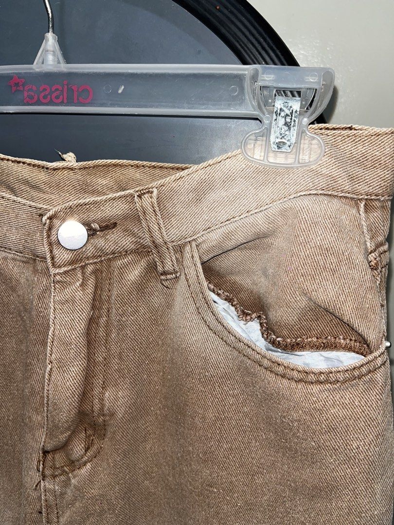 Brown denim pants straight leg (Category: Jeans) located in Rizal. Submitted by bypc5678 (Listing ID 1465357643, Image 3). Description: - Fit: Classic straight leg cut - Closure: Button fly - size 30 issue: himulmol, use lint remover.