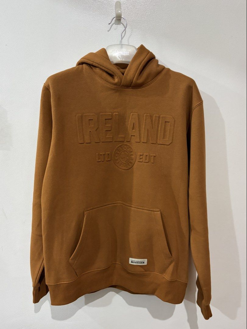 Brown Hoodie with Embossed Lettering (Category: Coats, Jackets and Outerwear) located in Quezon City. Submitted by estimadaj (Listing ID 1465305687, Image 1). Description: Unused but no tag Bought in Ireland Medium but can fit up to Large Payment mode: Gcash, BPI If meet-up, cash kaliwaan.