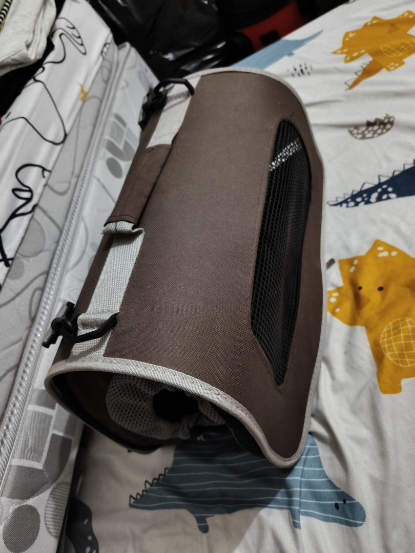 Brown Pet Carrier Bag with Mesh Windows (Category: Homes & Other Pet Accessories) located in Dasmarinas. Submitted by jp_0001 (Listing ID 1465336083, Image 2). Description: - Suitable for small dogs and cats - Sturdy flooring with great mesh ventilation - Convenient top grab handle and strap attachments.