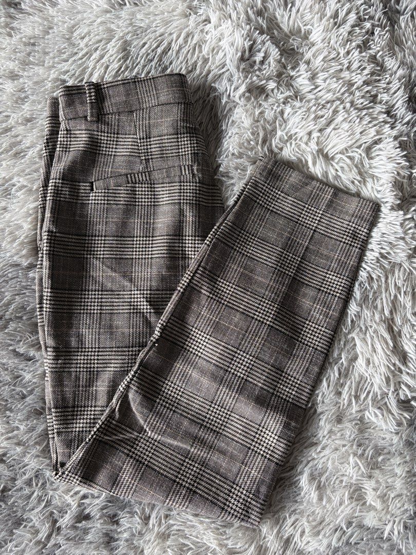Brown Plaid High Waisted Trousers (Category: Other Bottoms) located in Manila. Submitted by kez0020 (Listing ID 1465227455, Image 3). Description: - Classic brown and black plaid pattern - High-waist fit with convenient belt loops - Features functional front pockets - Modern straight-cut leg design - Versatile piece for workwear and casual outings - Easy to pair with basic tops and cozy sweaters.