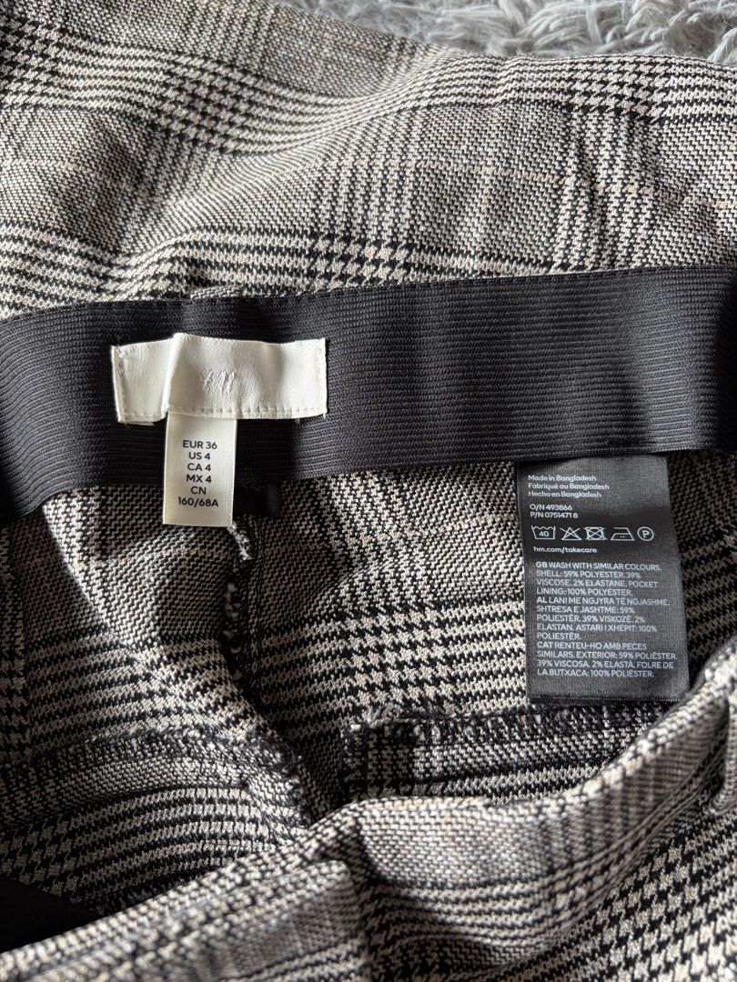 Brown Plaid High Waisted Trousers (Category: Other Bottoms) located in Manila. Submitted by kez0020 (Listing ID 1465227455, Image 2). Description: - Classic brown and black plaid pattern - High-waist fit with convenient belt loops - Features functional front pockets - Modern straight-cut leg design - Versatile piece for workwear and casual outings - Easy to pair with basic tops and cozy sweaters.