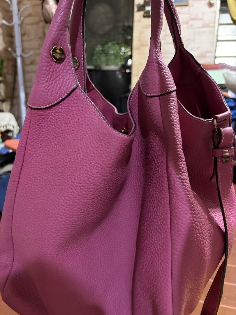 Bruno Magli Pink Pebbled Leather Tote Bag (Category: Luxury Bags & Wallets) located in Manila. Submitted by lynnalec25 (Listing ID 1465363003, Image 1). Description: - Brand: Bruno Magli - Material: Soft bright pink pebbled leather with white contrast stitching - Hardware: Gold-tone accents with side studs and branded zipper pull - Interior: Dark patterned lining with a branded leather patch and secure zipper compartments - Straps: Comfortable du
