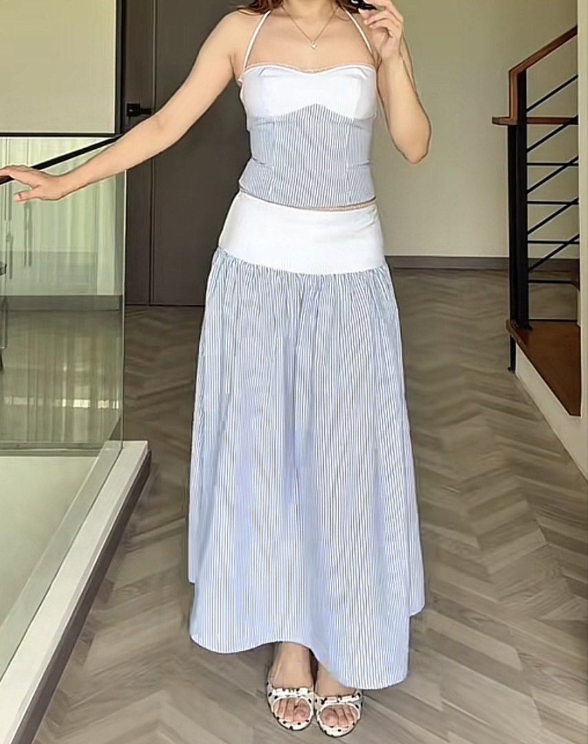 BSCO Piper Set (Category: Dresses) located in Baliuag. Submitted by haoareuu (Listing ID 1465173590, Image 3). Description: - blue and white pinstripe midi dress with a flared skirt - halter neckline with a white contrast top panel and corset-style bodice - open back with lace-up crisscross ties and adjustable halter straps - size M - brand new, sinukat lang - with tag and ziplock bag - RFS: declutter - price slightly negotiable, just really need