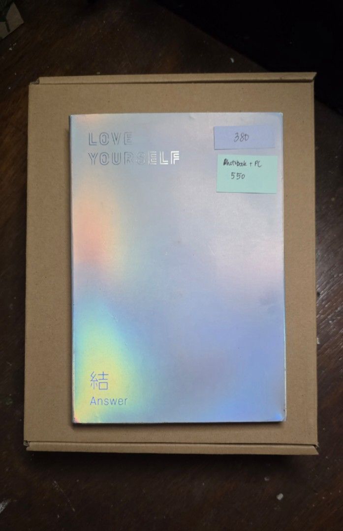 BTS Love Yourself Answer Album Unsealed (Category: CDs & DVDs) located in Manila. Submitted by chelsyenn (Listing ID 1465279468, Image 1). Description: - Item: BTS Love Yourself Answer Album - Cover: Holographic - Label: Big Hit Entertainment - Pricing: ₱380 (Photbook only) / ₱550 (Photobook + PC bundle) - Condition: Well-stored, -MOP: GCash, BDO, or Maya - Mode of fulfillment: Ready for shipping.