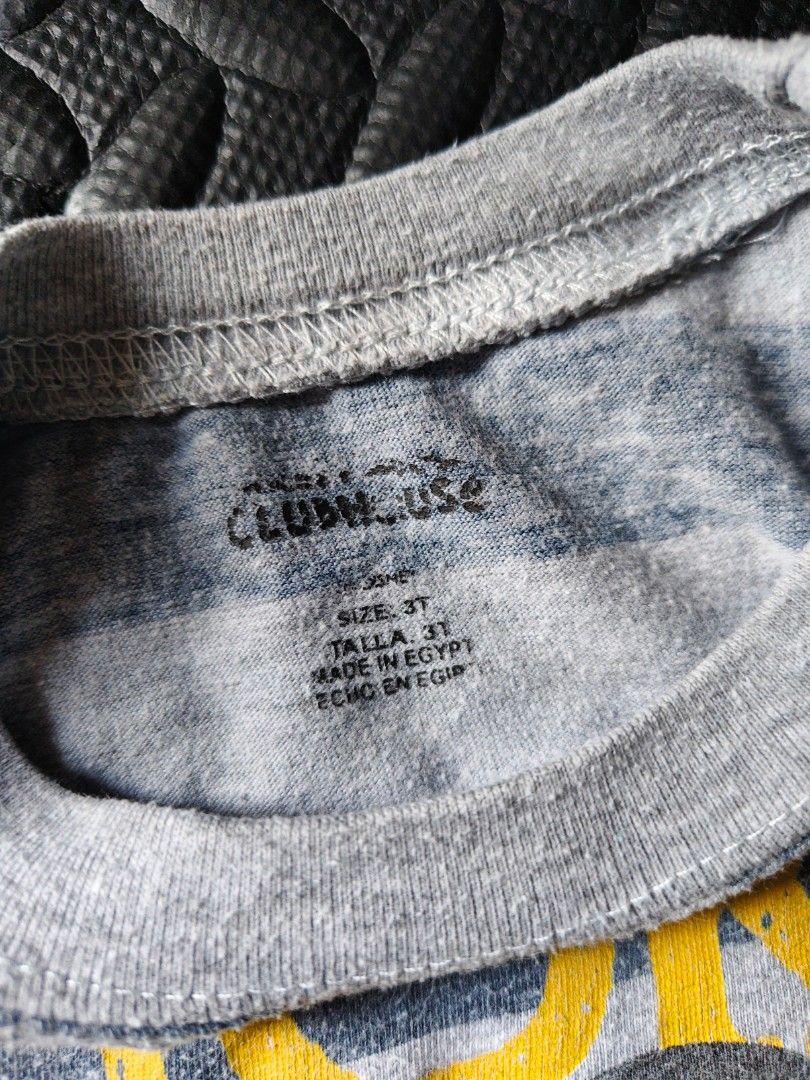 Bundle of 3 - Top (2 to 4 yrs old) (Category: Babies & Kids Fashion) located in Quezon City. Submitted by zs.onlinehub (Listing ID 1465189743, Image 2). Description: - Design: Grey and blue striped with large Mickey Mouse graphic and yellow lettering - Size: 3T (Made in Egypt) - Fit: 13 to 14 inches pit-to-pit - Condition/Use: Casual everyday top for toddlers - Deal: Feel free to message for inquiries or bundle discounts!.
