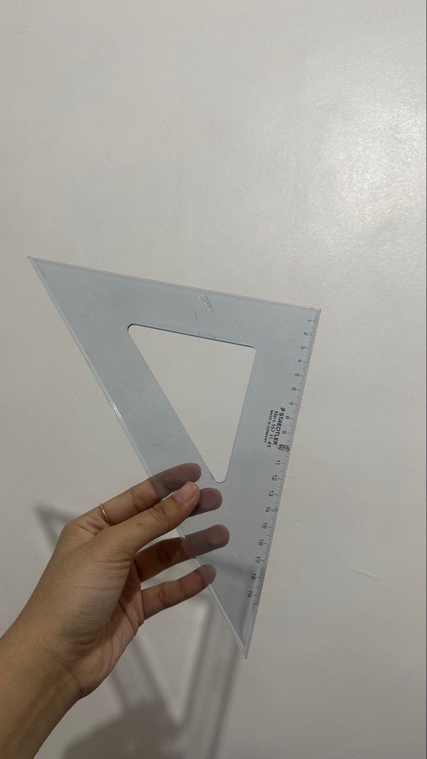 BUNDLE Staedtler Mars Triangle, Rulers, T Square (LOST HEAD) (Category: Stationery & School Supplies) located in Dasmarinas. Submitted by tracylogy (Listing ID 1465301077, Image 1). Description: - Authentic Staedtler Mars 567 31-45 technical triangle ruler (Made in Germany) - Durable clear plastic material with precise printed metric measurements - No major cracks or heavy scratches - Ideal for drafting, technical drawings, architecture, and scho