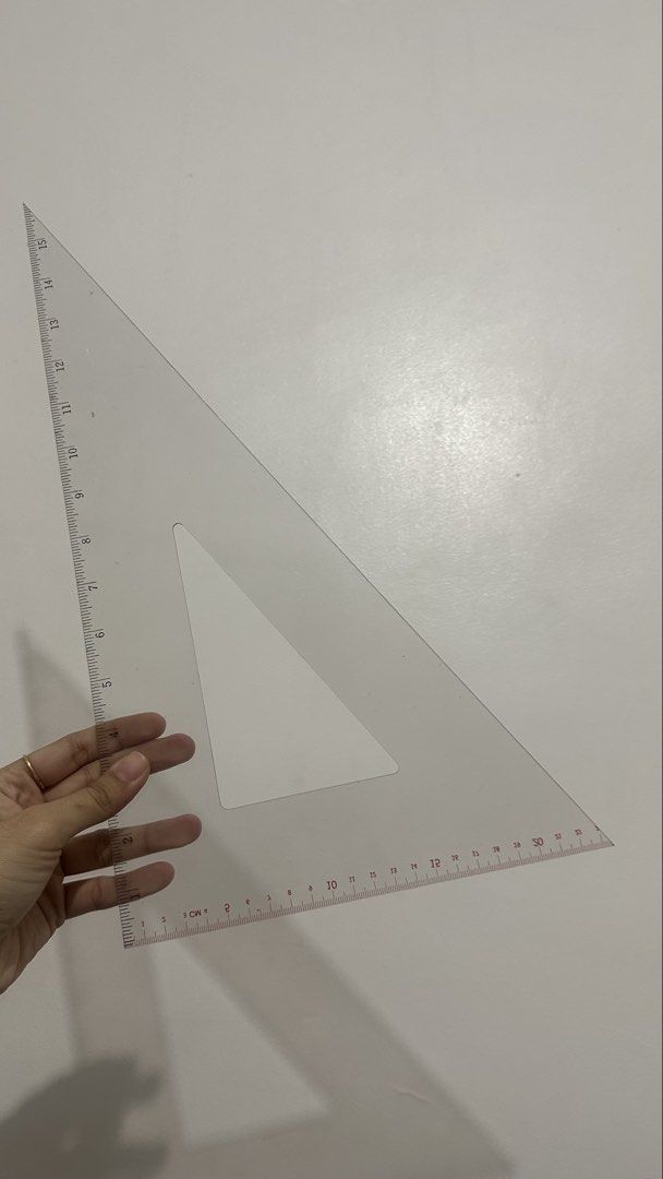 BUNDLE Staedtler Mars Triangle, Rulers, T Square (LOST HEAD) (Category: Stationery & School Supplies) located in Dasmarinas. Submitted by tracylogy (Listing ID 1465301077, Image 3). Description: - Authentic Staedtler Mars 567 31-45 technical triangle ruler (Made in Germany) - Durable clear plastic material with precise printed metric measurements - No major cracks or heavy scratches - Ideal for drafting, technical drawings, architecture, and scho