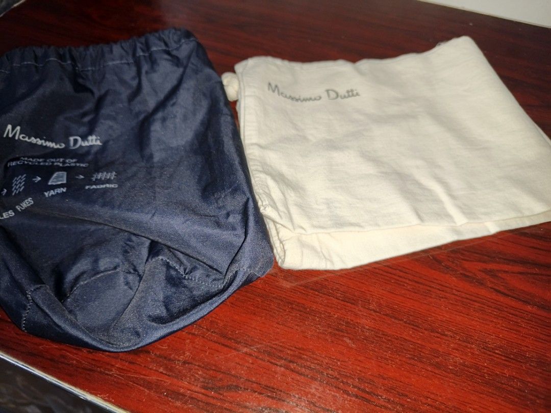 Burberry & Massimo Dutti Dust Bags Bundle (Category: Tote Bags) located in Paranaque City. Submitted by bdlgy (Listing ID 1465323122, Image 2). Description: - Authentic dust bags from Burberry London England and Massimo Dutti - Colors: Cream and dark blue - Various sizes included for bags and small accessories - Ideal for storing and protecting luxury items from dust and scratches - Selling as a set.