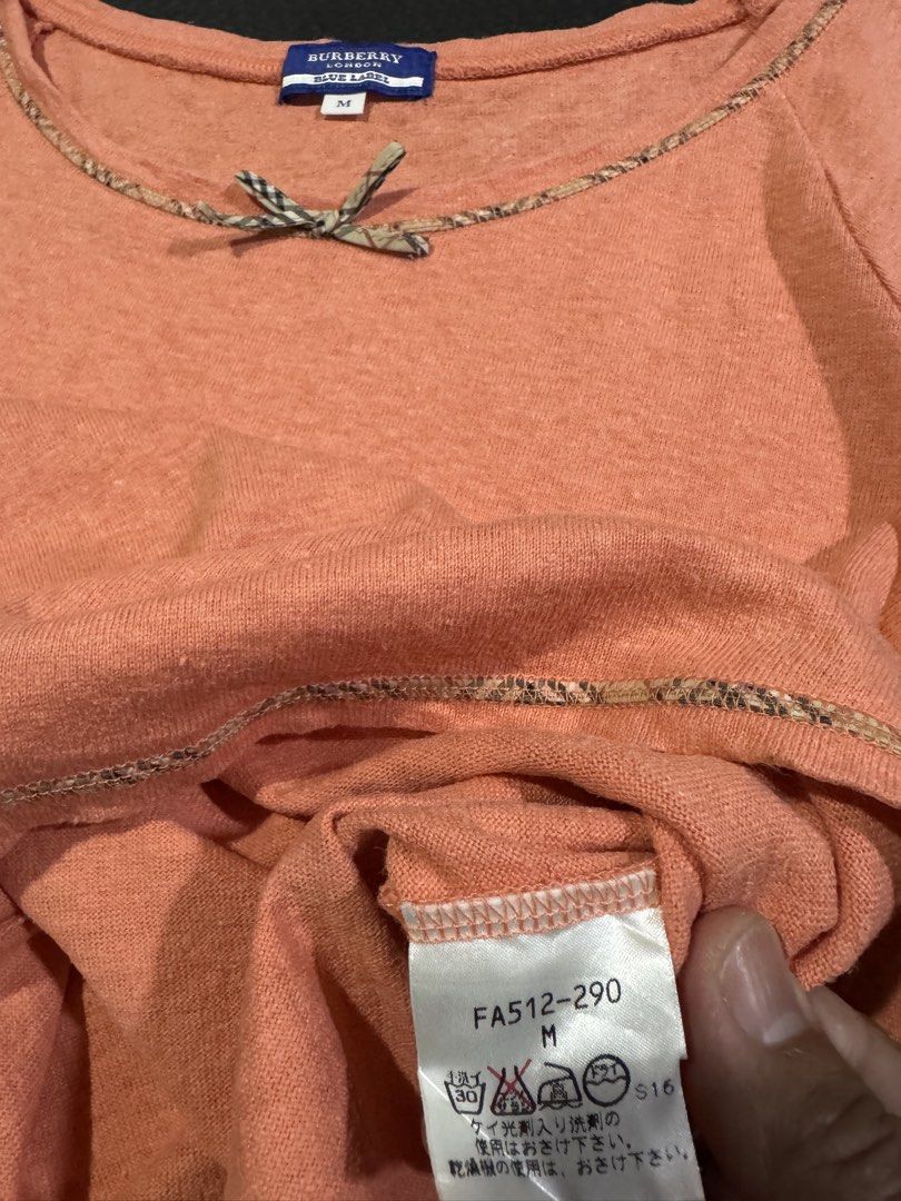 Burberry blue label tops (Category: Blouses) located in Cebu City. Submitted by etnaner (Listing ID 1465382283, Image 3). Description: Burberry Blue Label tops Size: medium on tag ( see actual dimes) Used in good condition Minor flaw: dot stain.