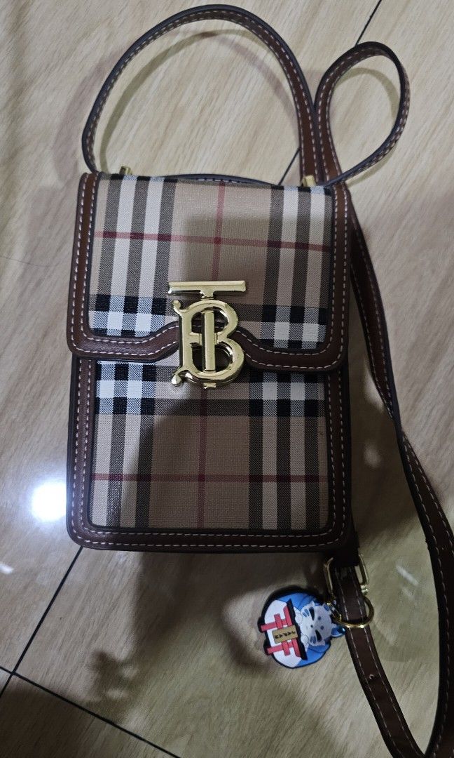 Burberry Like New Mini Bag (Category: Luxury Bags & Wallets) located in Quezon City. Submitted by Ley97 (Listing ID 1465281346, Image 2). Description: •like new • comes with box and dust bag.